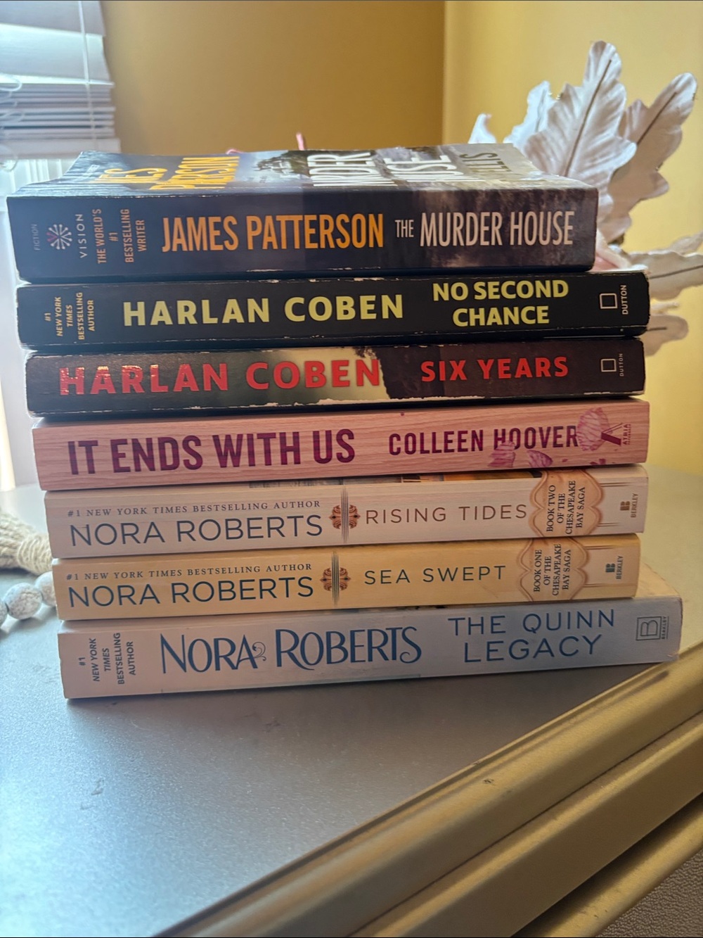 Stacked Paperback Book Set in Black, Red, Pink, Cream, and Tan